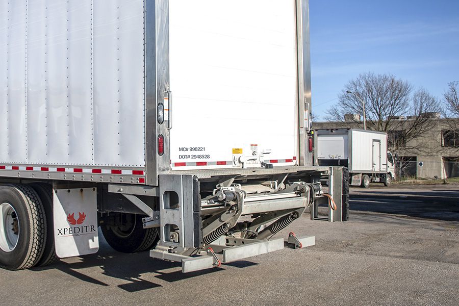 The lift gate for an Xpeditr winery shipping truck