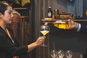 Sommelier pouring wine